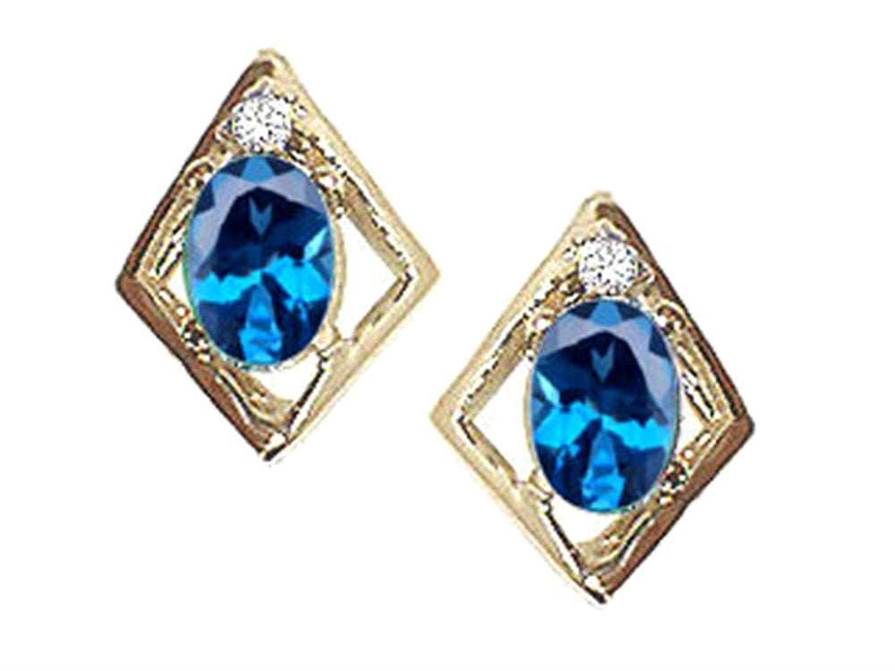 Tommaso Design Oval 6x4mm Genuine Blue Topaz Earrings