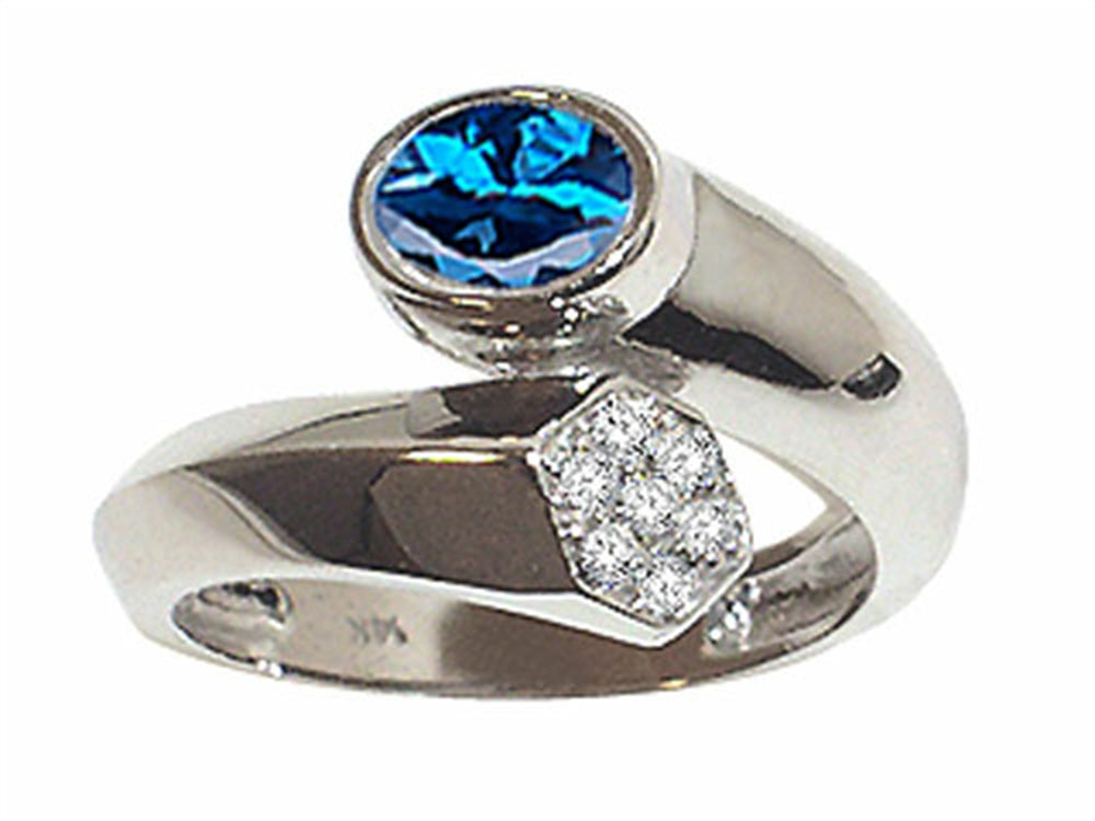 Tommaso Design Oval 7x5mm Genuine Blue Topaz Ring