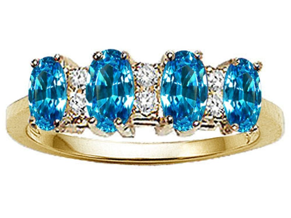Tommaso Design Oval 5x3mm Genuine 4 Stone Blue Topaz Ring