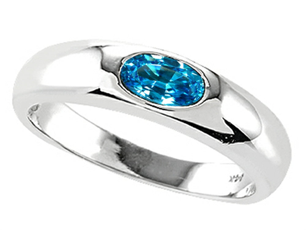 Tommaso Design Oval 6x4mm Genuine Blue Topaz Birthstone Wedding Band