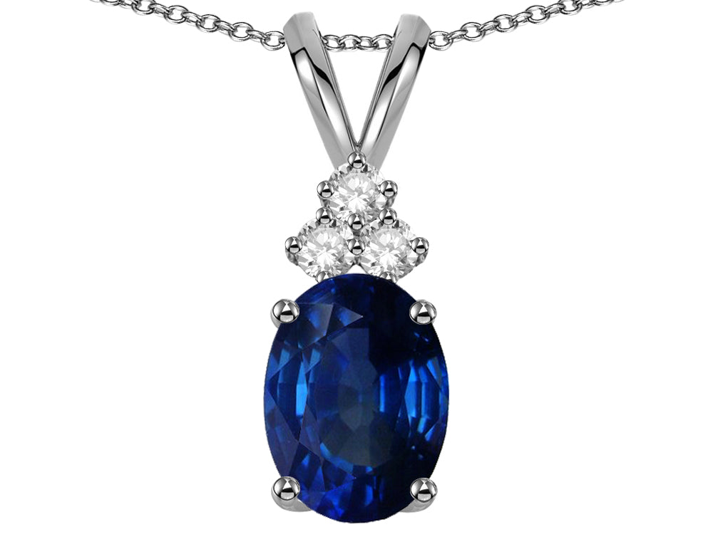 Star K Classic Oval 8x6mm Created Sapphire Rabbit Ear Pendant Necklace