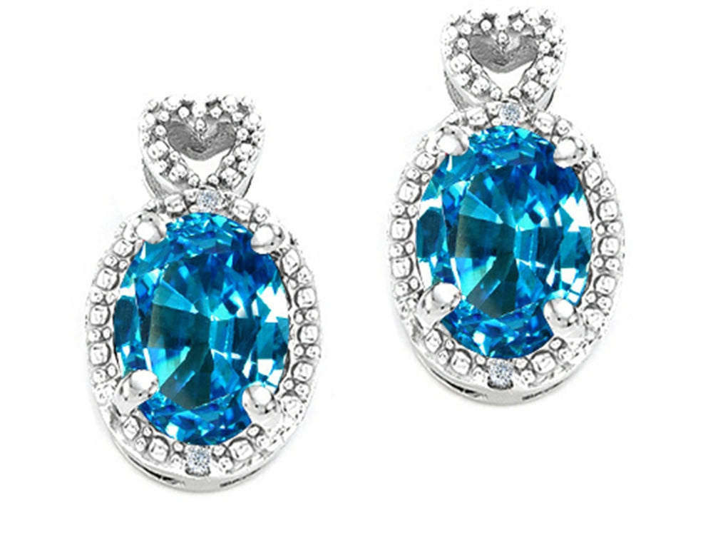 Tommaso Design Oval 7x5mm Genuine Blue Topaz Earrings