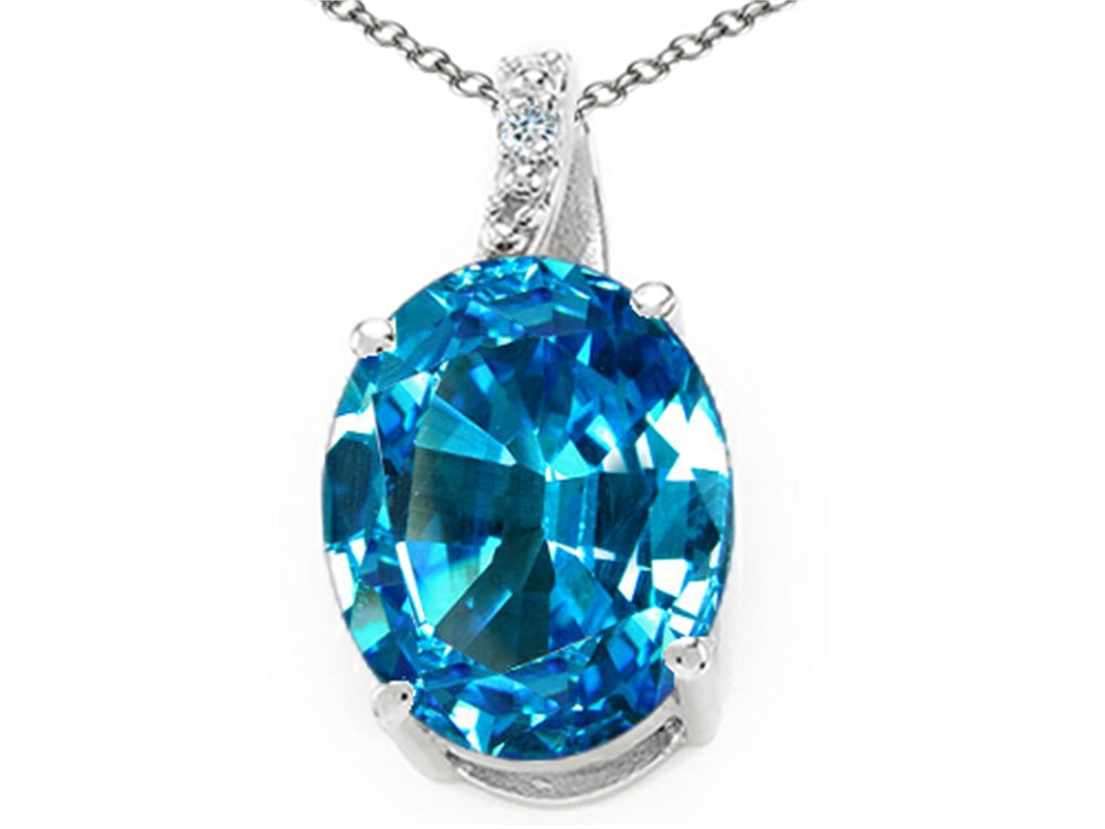Tommaso Design Oval 9x7mm Genuine Blue Topaz and Diamond Pendant Necklace