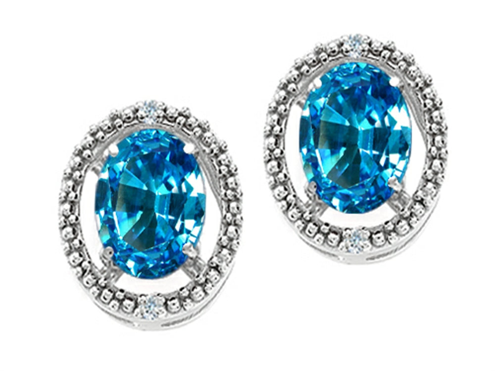 Tommaso Design Oval 8x6mm Genuine Blue Topaz Earrings