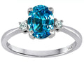 Tommaso Design 8x6mm Oval Genuine Blue Topaz Engagement Ring