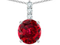 Star K  7mm Round Created Ruby Three Stone Pendant Necklace