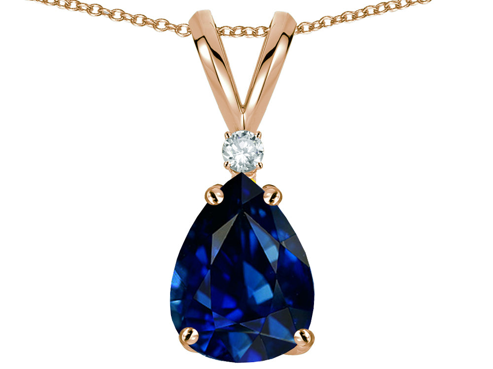Star K Classic Pear Shape 8x6mm Created Sapphire Rabbit Ear Pendant Necklace
