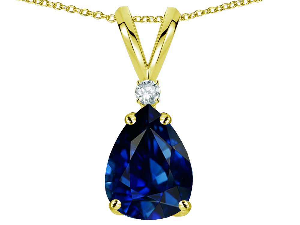 Star K Classic Pear Shape 8x6mm Created Sapphire Rabbit Ear Pendant Necklace