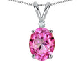 Star K Oval 8x6mm Created Pink Sapphire Rabbit Ear Pendant Necklace