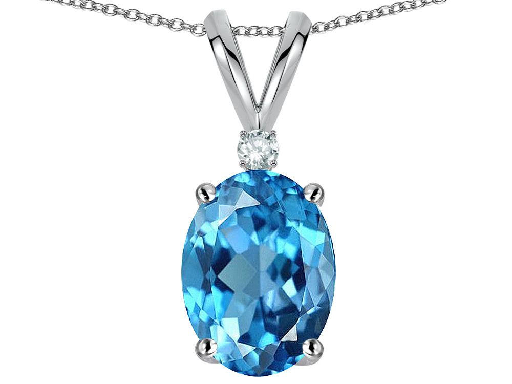 Star K Oval 8x6mm Genuine Blue Topaz Rabbit Ear Pendant Necklace