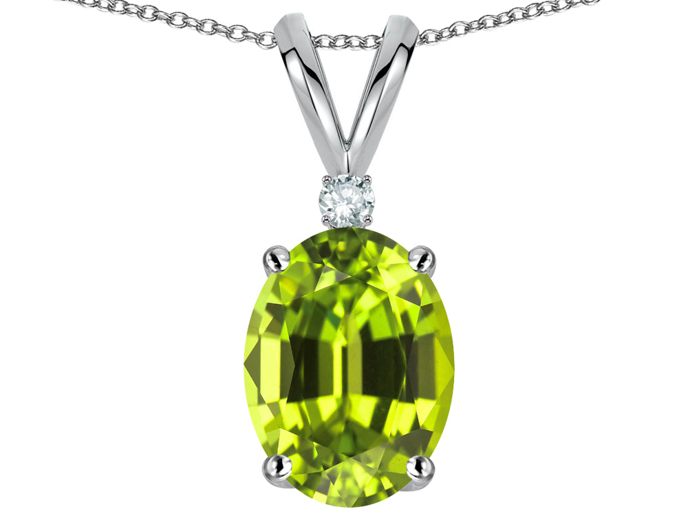 Star K Oval 8x6mm Genuine Peridot Rabbit Ear Pendant Necklace
