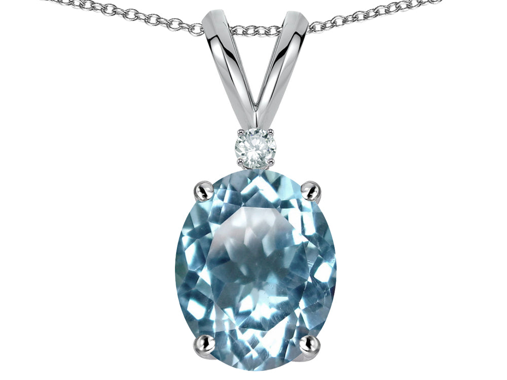 Star K Oval 8x6mm Genuine Sky Blue Topaz Rabbit Ear Pendant Necklace