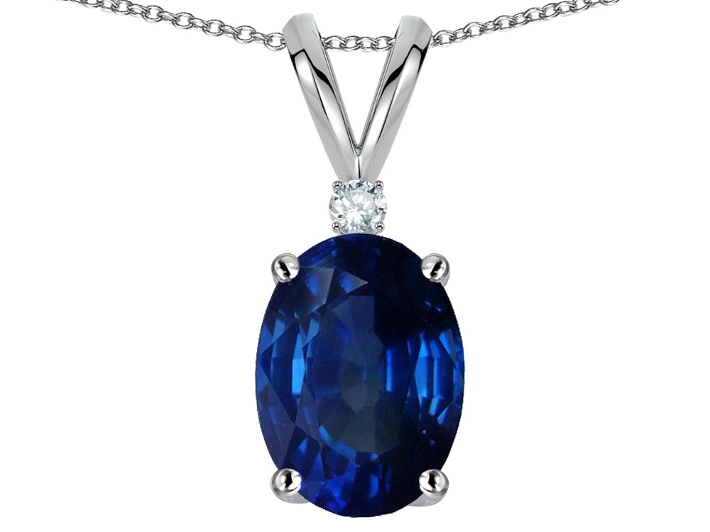 Star K Classic Single Oval 8x6mm Created Sapphire Rabbit Ear Pendant Necklace