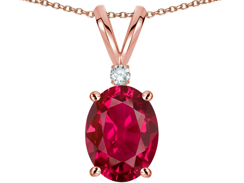 Star K Oval 8x6mm Created Ruby Rabbit Ear Pendant Necklace