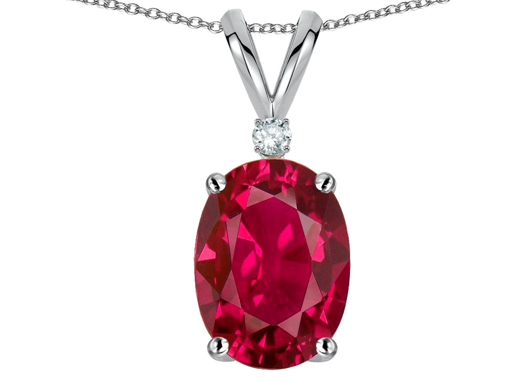 Star K Oval 8x6mm Created Ruby Rabbit Ear Pendant Necklace