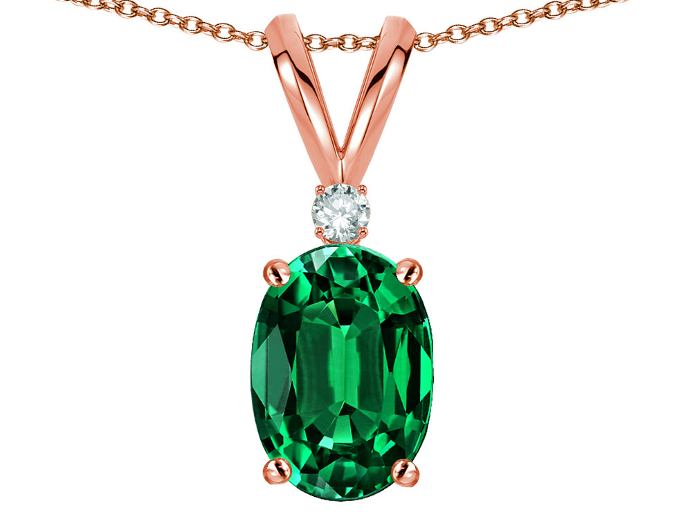 Star K Oval 7x5mm Simulated Emerald Classic Rabbit Ears Pendant Necklace