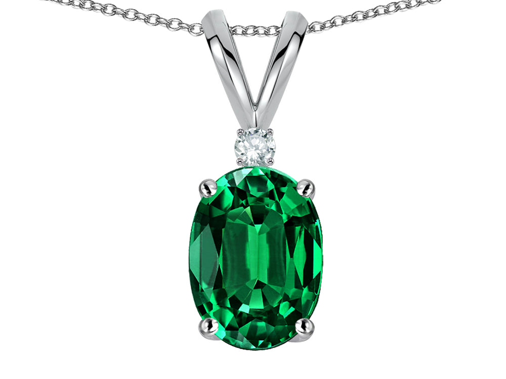 Star K Oval 7x5mm Simulated Emerald Classic Rabbit Ears Pendant Necklace