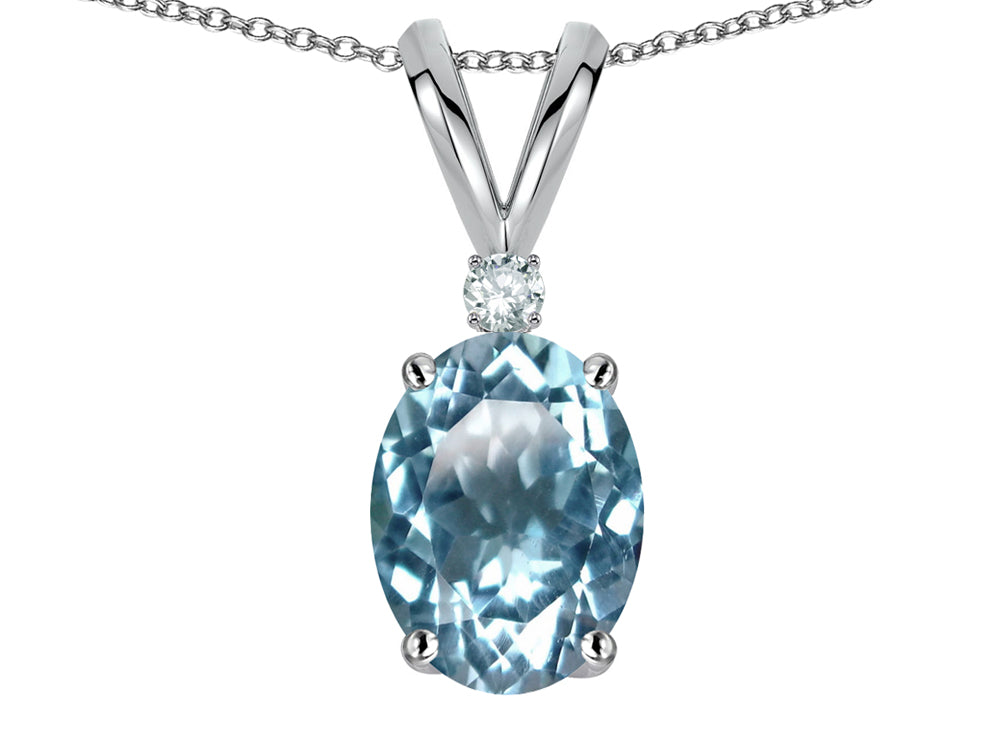 Star K Oval 7x5mm Genuine Sky Blue Topaz Classic Rabbit Ears Pendant Necklace