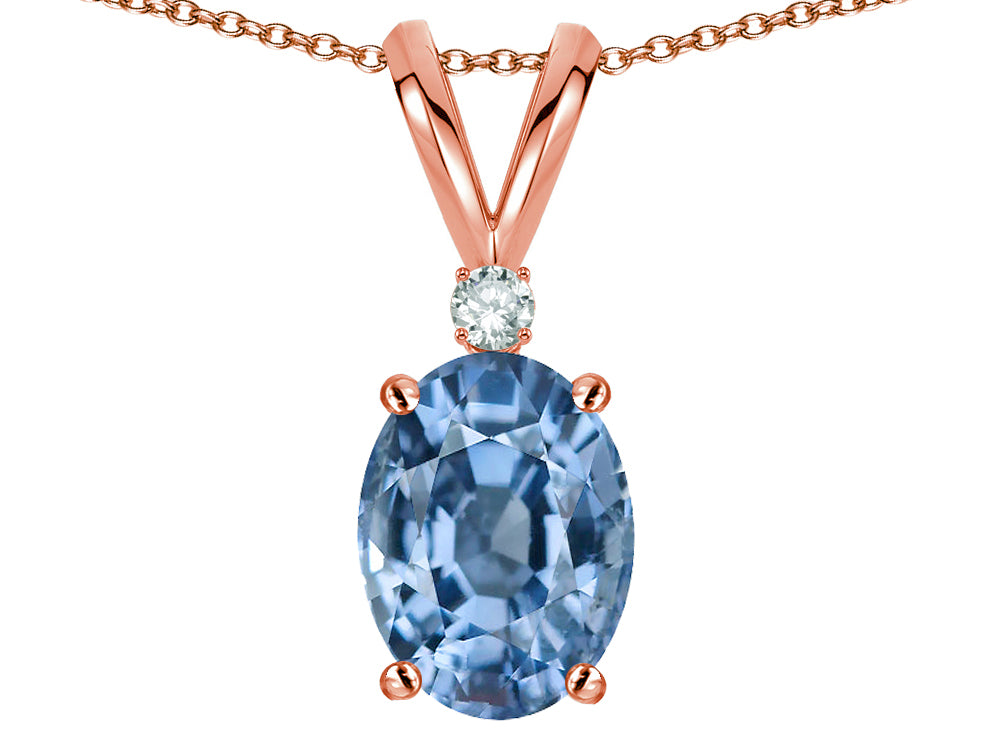 Star K Oval 7x5mm Simulated Aquamarine Classic Rabbit Ears Pendant Necklace