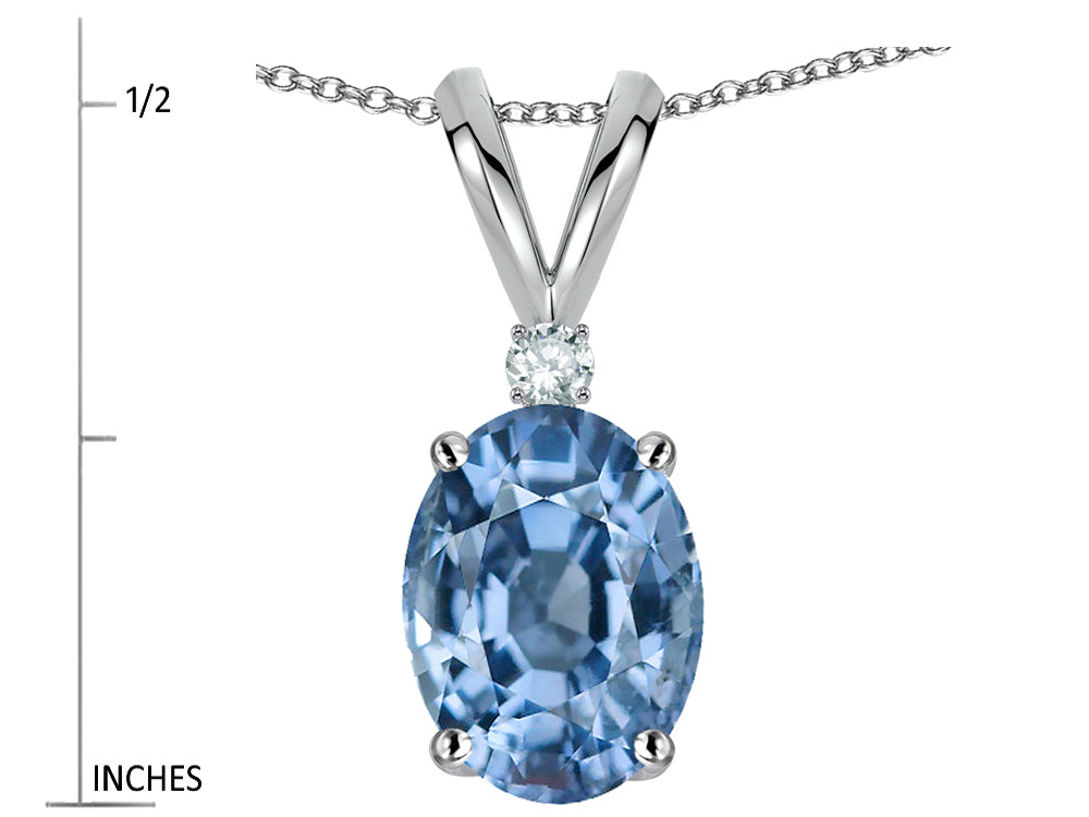 Star K Oval 7x5mm Simulated Aquamarine Classic Rabbit Ears Pendant Necklace