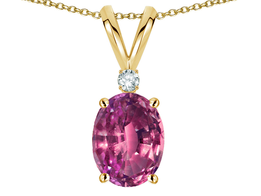 Star K Oval 7x5mm Genuine Pink Tourmaline Classic Rabbit Ears Pendant Necklace