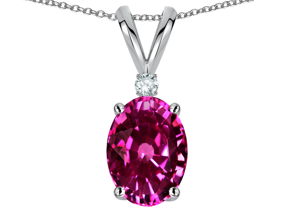 Star K Oval 7x5mm Simulated Pink Tourmaline Classic Rabbit Ears Pendant Necklace