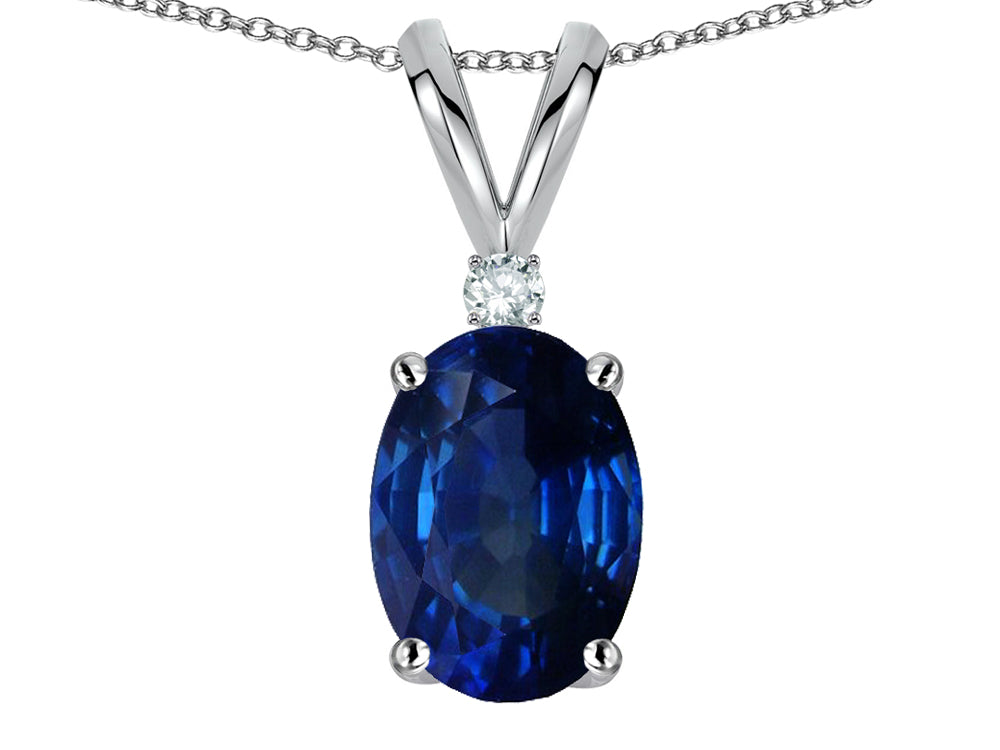 Star K Oval 7x5mm Created Sapphire Classic Rabbit Ears Pendant Necklace