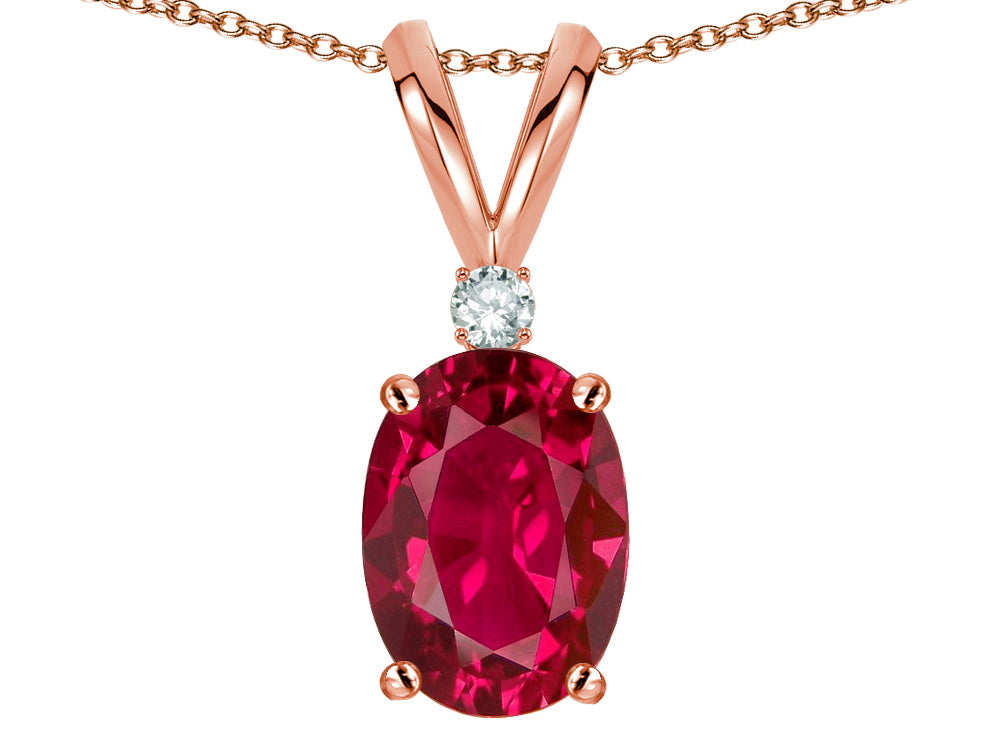 Star K Oval 7x5mm Created Ruby Classic Rabbit Ears Pendant Necklace