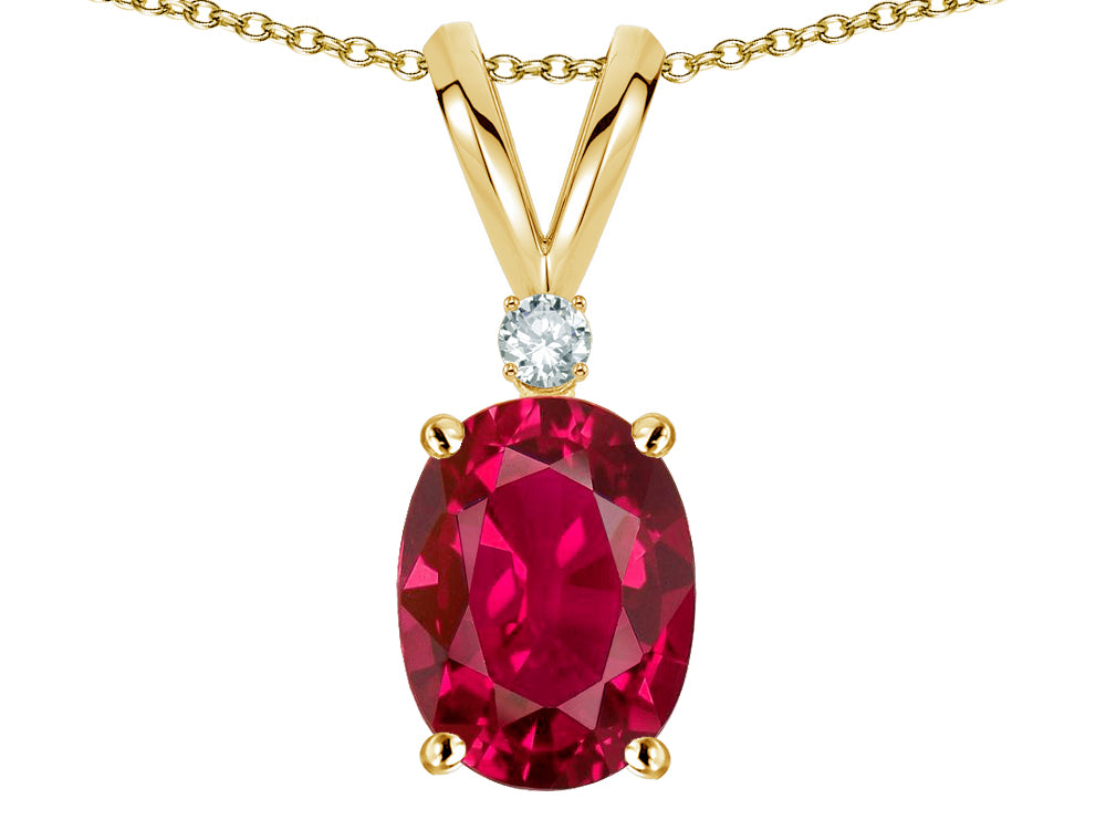 Star K Oval 7x5mm Created Ruby Classic Rabbit Ears Pendant Necklace