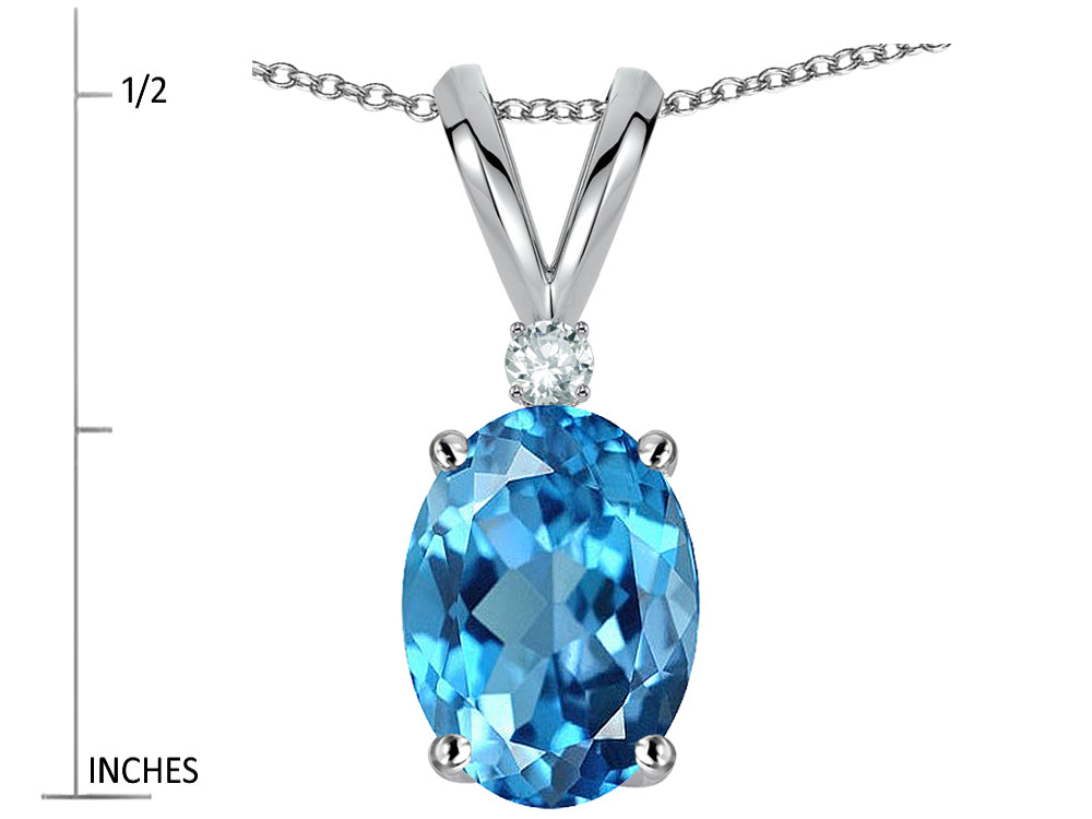 Star K Oval 7x5mm Genuine Blue Topaz Classic Rabbit Ears Pendant Necklace