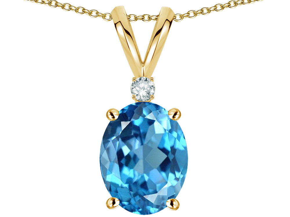 Star K Oval 8x6mm Genuine Blue Topaz Rabbit Ear Pendant Necklace