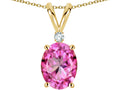 Star K Oval 8x6mm Created Pink Sapphire Rabbit Ear Pendant Necklace