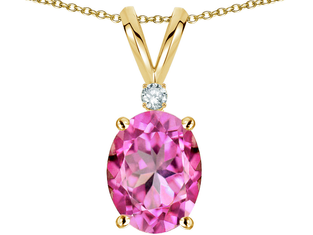 Star K Oval 8x6mm Created Pink Sapphire Rabbit Ear Pendant Necklace