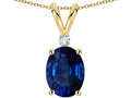 Star K Oval 8x6mm Created Sapphire Rabbit Ear Pendant Necklace