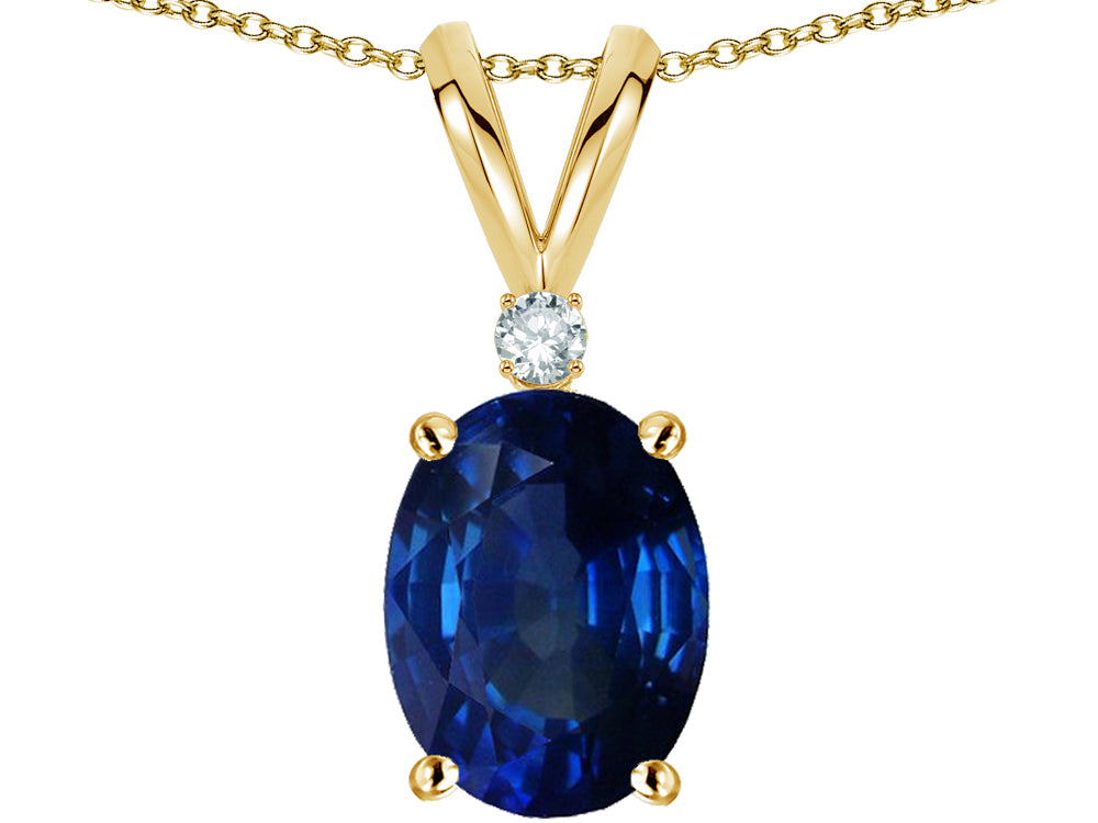Star K Oval 8x6mm Created Sapphire Rabbit Ear Pendant Necklace