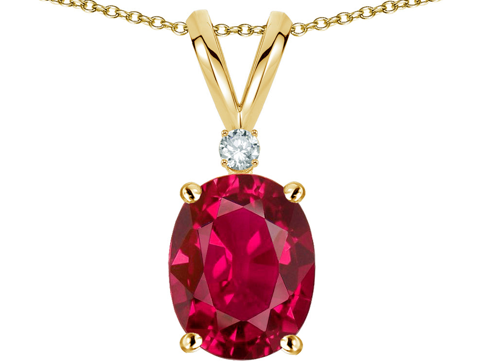 Star K Oval 8x6mm Created Ruby Rabbit Ear Pendant Necklace