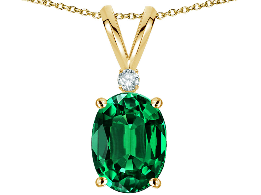 Star K Oval 8x6mm Simulated Emerald Rabbit Ear Pendant Necklace