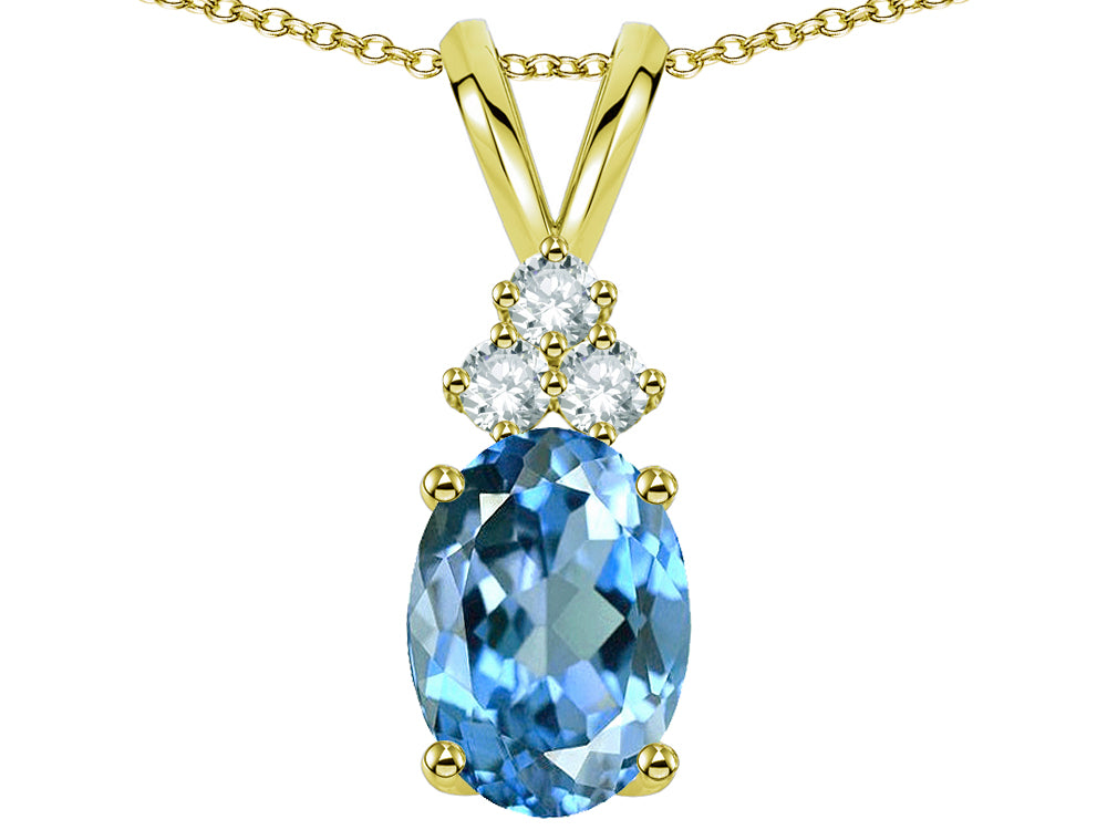 Star K Oval 8x6mm Genuine Blue Topaz Rabbit Ear Pendant Necklace