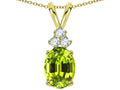 Star K Oval 8x6mm Genuine Peridot Rabbit Ear Pendant Necklace