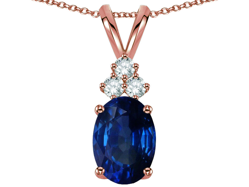 Star K Classic Oval 8x6mm Created Sapphire Rabbit Ear Pendant Necklace