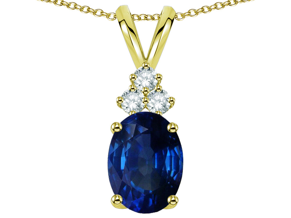 Star K Classic Oval 8x6mm Created Sapphire Rabbit Ear Pendant Necklace