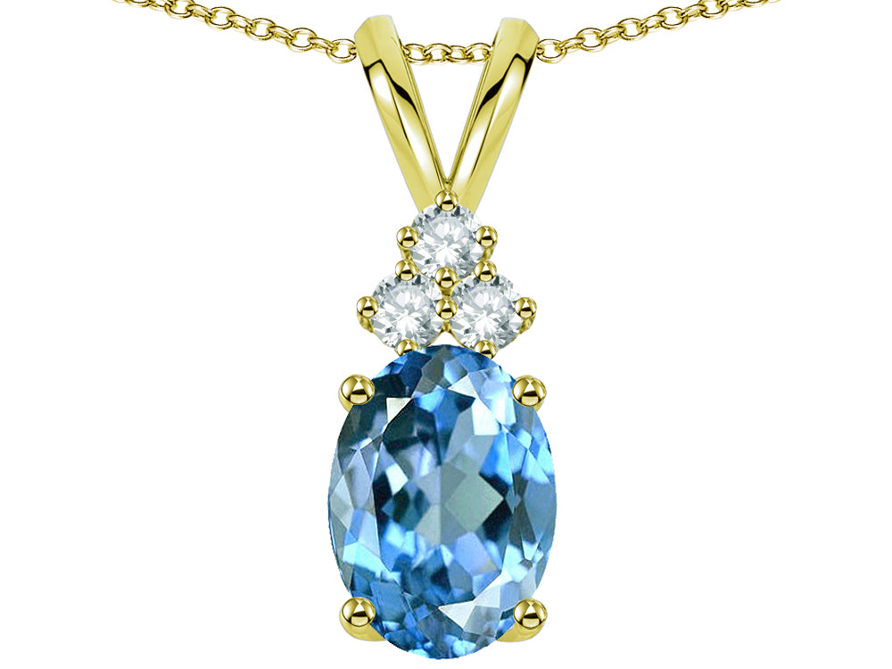 Star K Oval 8x6mm Genuine Blue Topaz Rabbit Ear Pendant Necklace