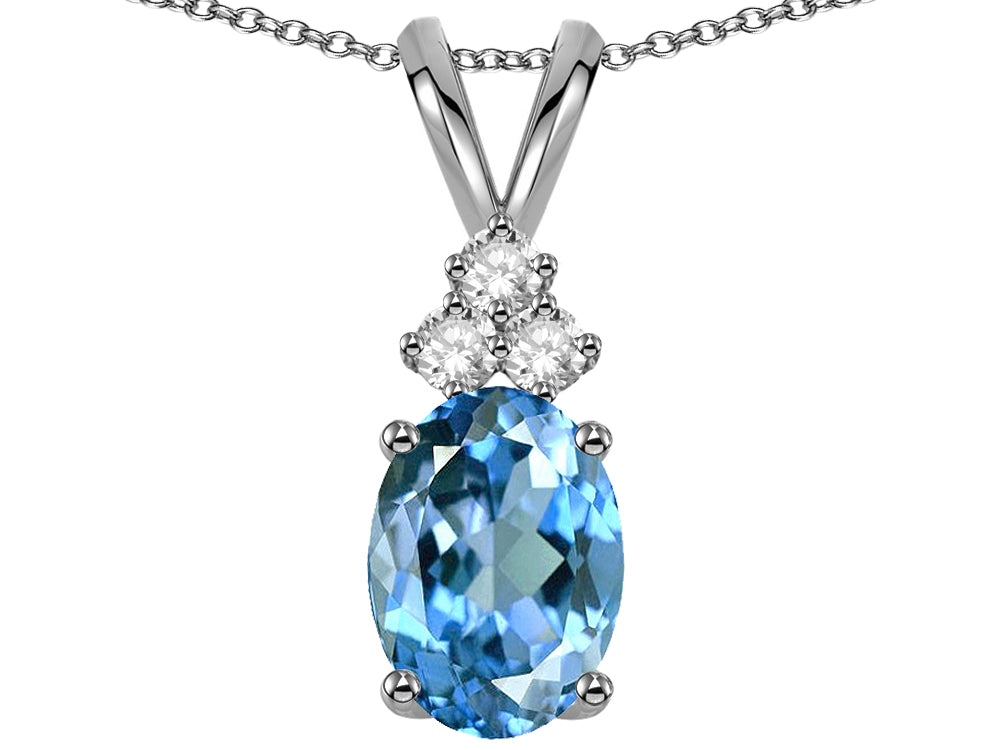 Star K Oval 8x6mm Genuine Blue Topaz Rabbit Ear Pendant Necklace