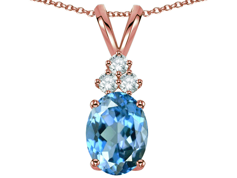 Star K Oval 8x6mm Genuine Blue Topaz Rabbit Ear Pendant Necklace