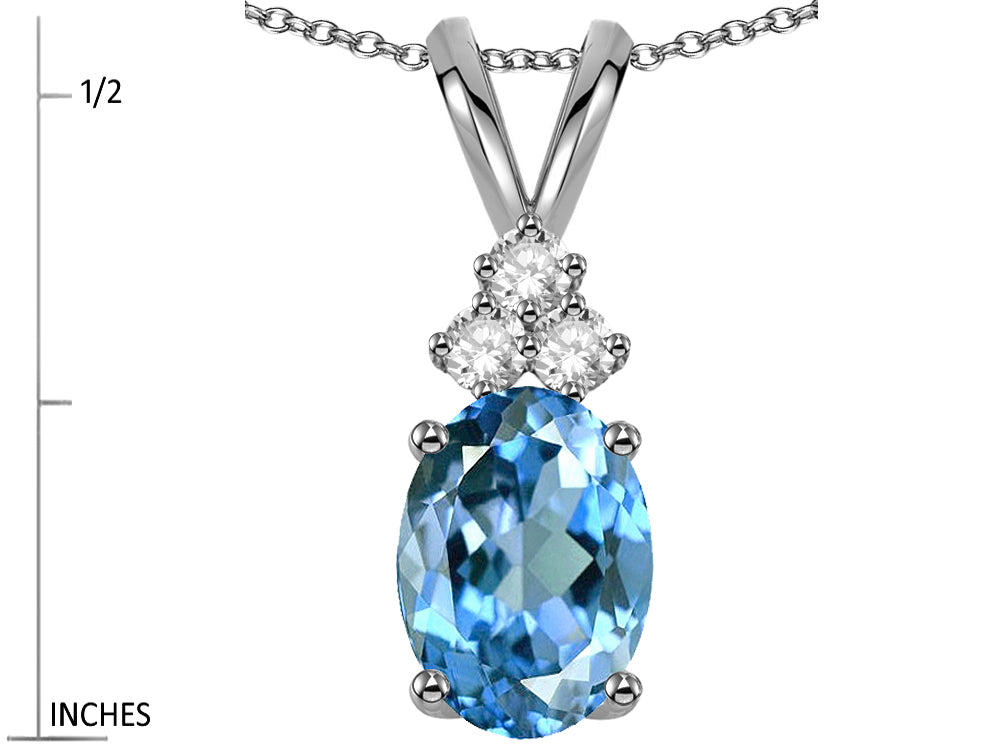 Star K Oval 8x6mm Genuine Blue Topaz Rabbit Ear Pendant Necklace