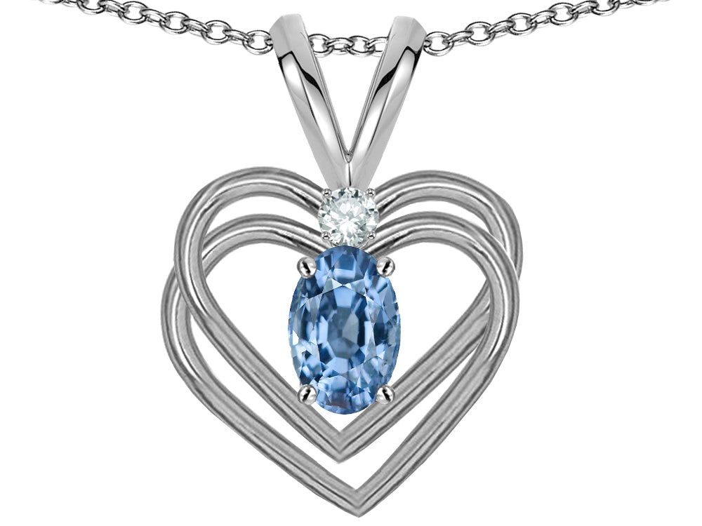 Star K Oval 5x3mm Simulated Aquamarine Knotted Double Heart Pendant Necklace