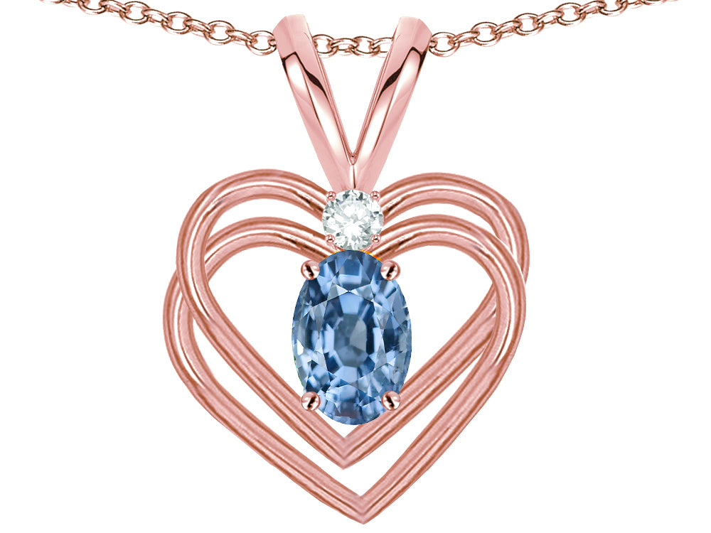Star K Oval 5x3mm Simulated Aquamarine Knotted Double Heart Pendant Necklace