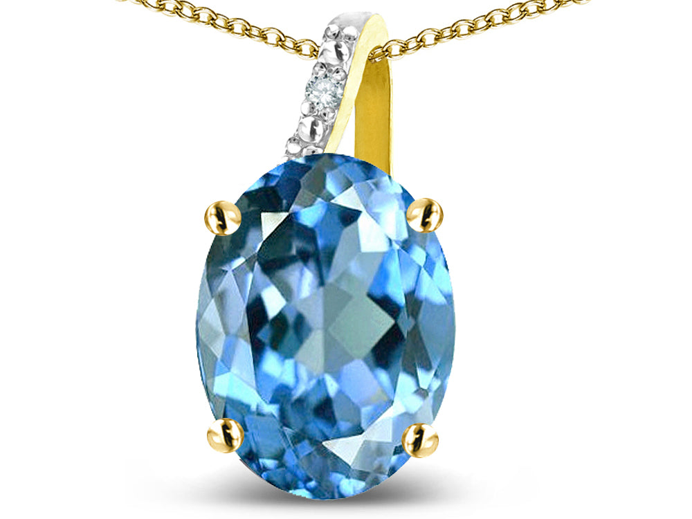 Star K 14k Gold Oval 9x7 Genuine Blue Topaz Journey Pendant Necklace
