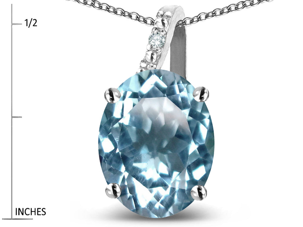 Star K 14k Gold Oval 9x7 Genuine Sky Blue Topaz Journey Pendant Necklace