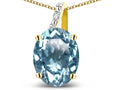 Star K 14k Gold Oval 9x7 Genuine Sky Blue Topaz Journey Pendant Necklace
